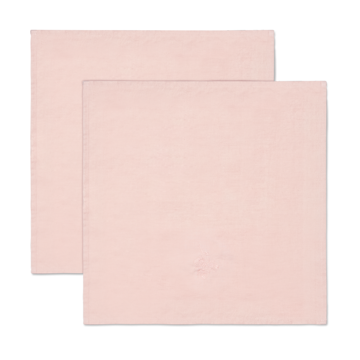 Fine linen napkin with an embroidered motif of hazelnut and fish.