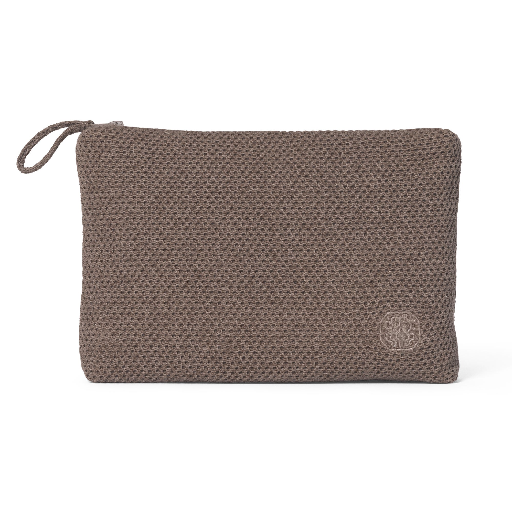 The toiletry bag from Jensen Damask is essential and